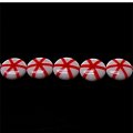 Bead, lampworked glass, red/white, 12mm double-sided flat round with starlike design