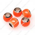 Glow beads,7x9mm round shape,orange color. Sold of 50 PCS